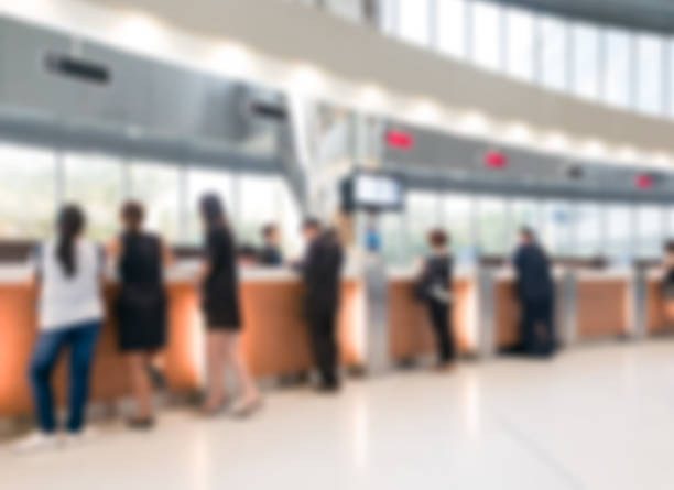 Blurred customer transaction in bank counter