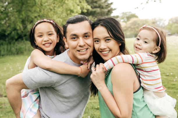 istock Happy family having fun outdoor 852114764