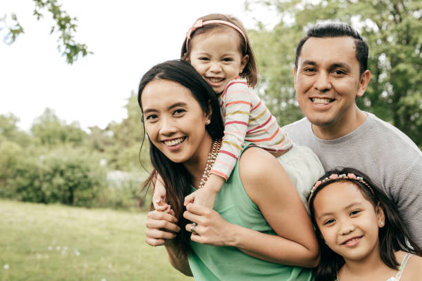 istock Happy family having fun outdoor 852114790