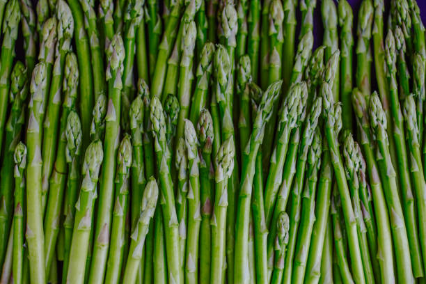 Asparagus Directly above view of baby asparaguses asparagus stock pictures, royalty-free photos & images