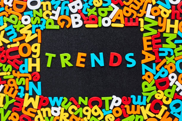 istock Overhead view of trends text amidst colorful alphabets on blackboard 852119454