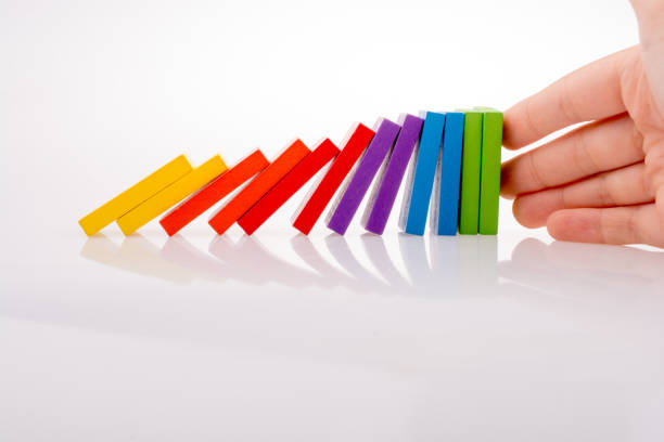 istock Hand holding color dominoes 852119946