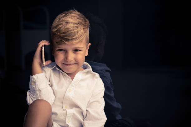 istock Happy boy on the phone. 852125798