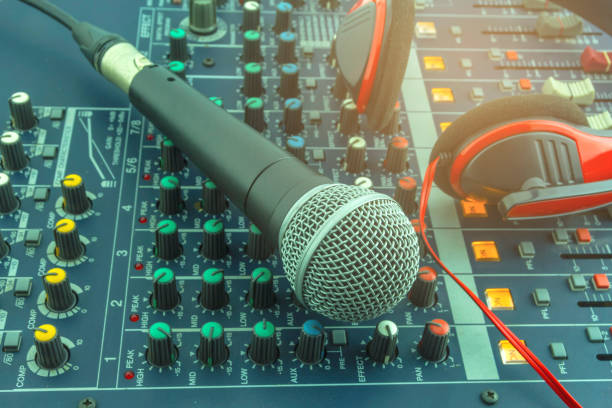 istock Microphone with recording room equipment. 852126196