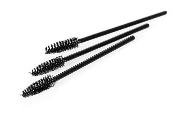 istock Cosmetic tassels for applying mascara on eyelashes isolated on white. 852129580