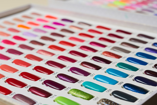 nails salon and beauty treatment concept, colorful samples of nails colors.