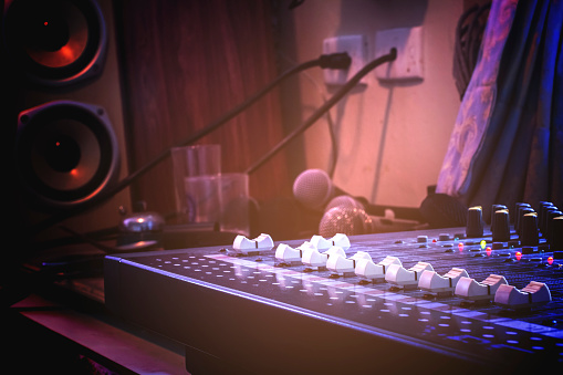 Audio control buttons for professional sound engineers. Selective focus.