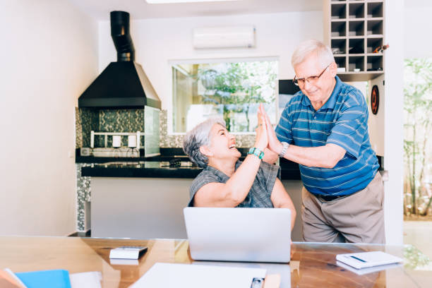 istock Senior couple surfing the web and cheering 852142242