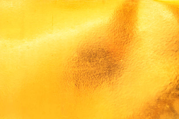 istock Shiny yellow leaf gold foil texture background 852143028