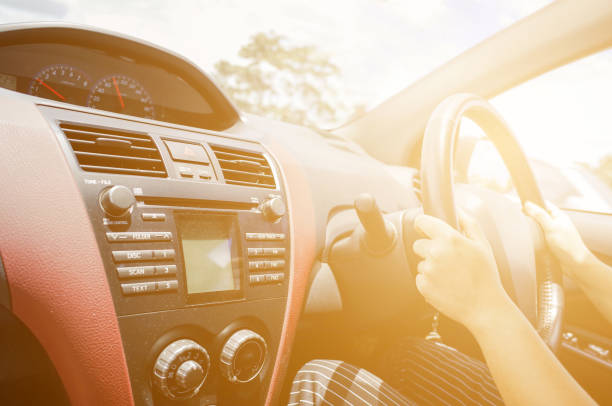 istock woman hand driving car 852148556