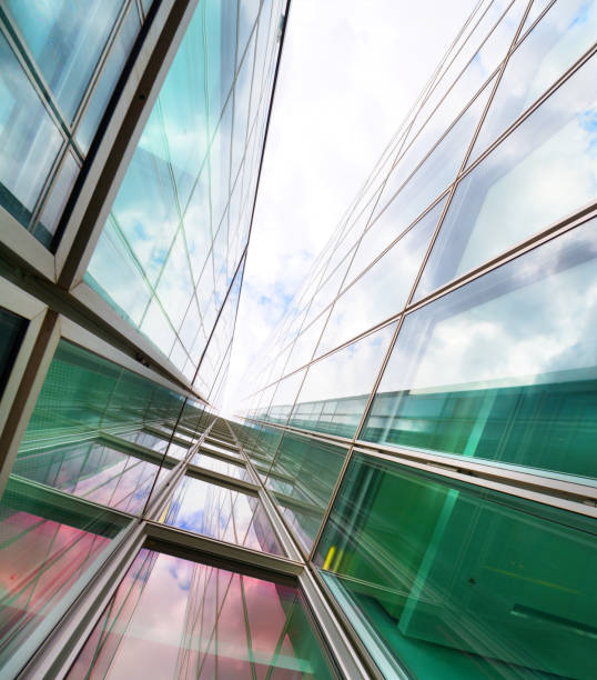 istock Bright future, finance buildings seen from below, sun 852149308