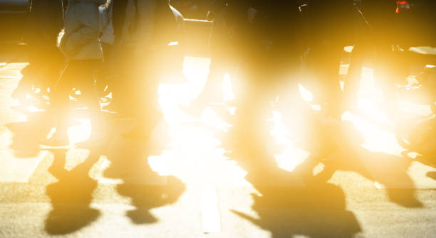 istock Zebra acrossing, pedestrians in fall sun 852149968