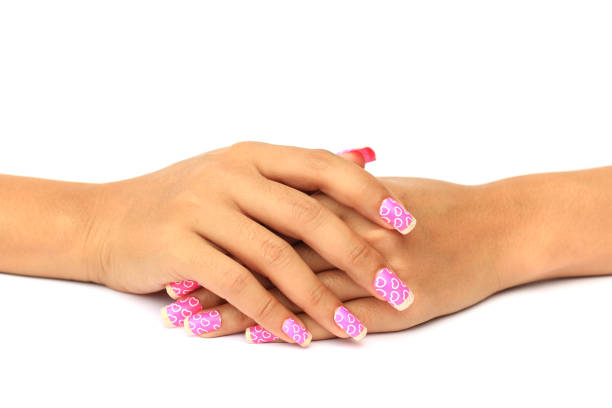 istock Selective focus of Beautiful manicure design with a pattern on the nails, Manicure nail color design samples 852149978