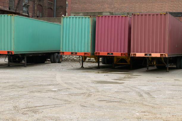 istock Truck freight trailers parked at commercial depot 852157936