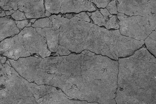 黒と白セメントの地面の背景 - toughness ストックフォトと画像