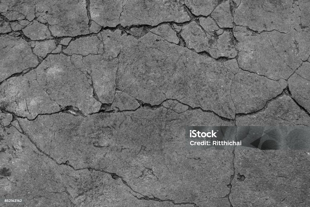 The black and white cement ground background Cracked Stock Photo