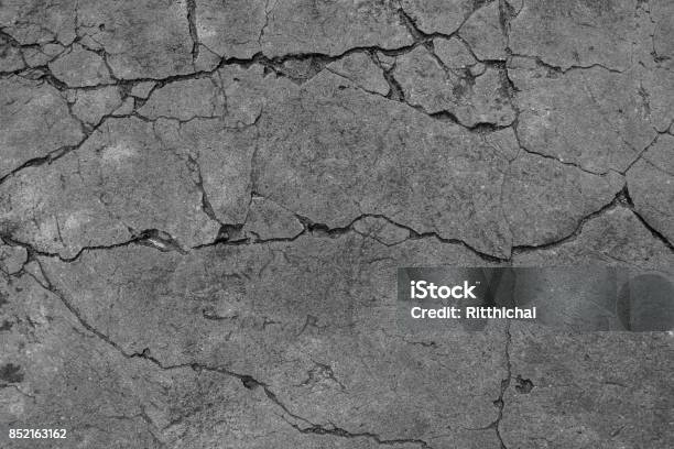 The Black And White Cement Ground Background Stock Photo - Download Image Now - Cracked, Textured, Concrete