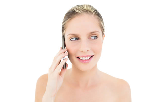 istock Thinking fresh blonde woman making a phone call 852173678