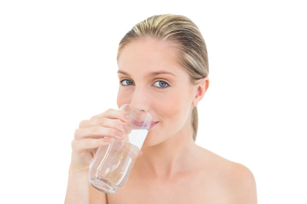 istock Lovely fresh blonde woman drinking water 852174152