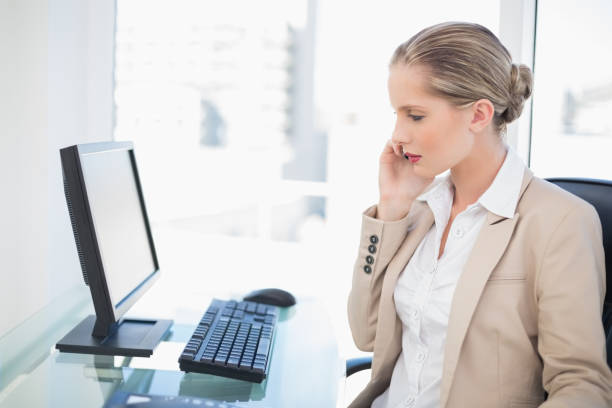 istock Serious blonde businesswoman having a phone call posing 852178162