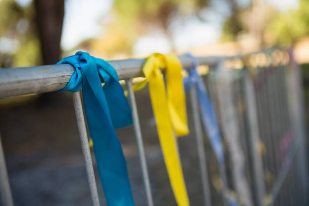 Decorative ribbons tied on a railing in the park