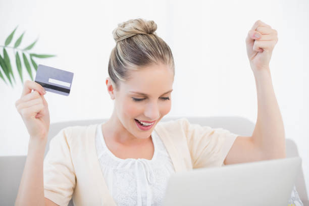 istock Excited fresh model shopping online using laptop 852185236