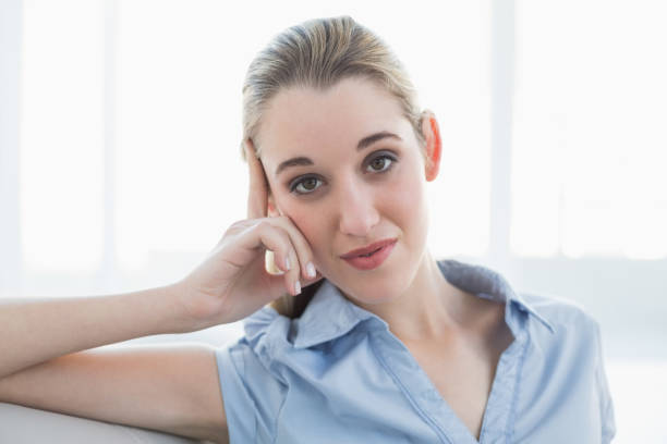 istock Chic businesswoman looking seriously at camera 852192294