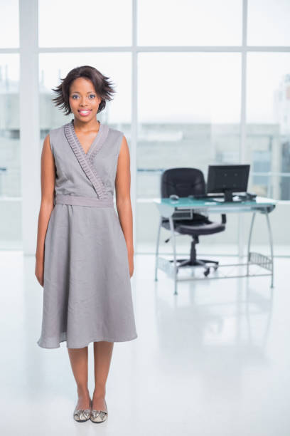 istock Smiling businesswoman standing in her office 852221028
