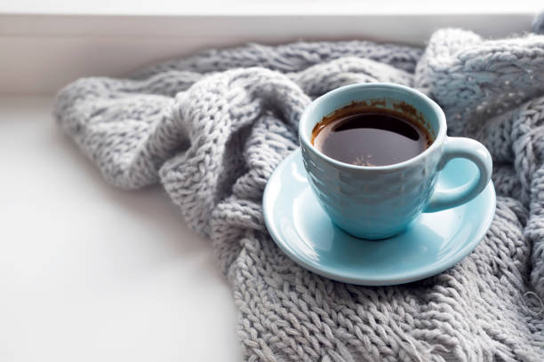 istock cozy soft gray blanket with a cup of coffee 852237288
