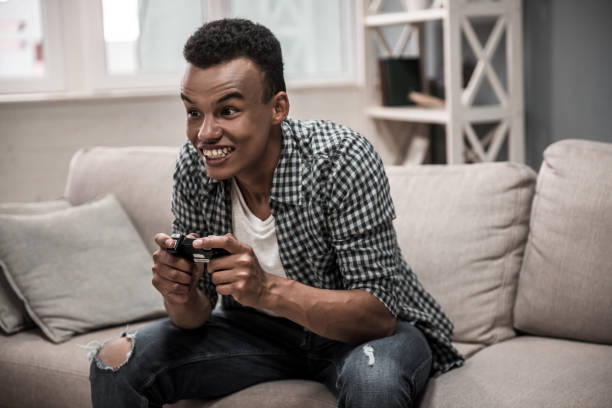 istock Afro American guy at home 852247514