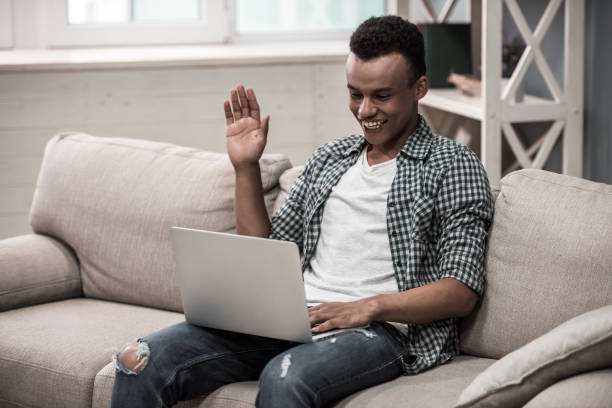 istock Afro American guy at home 852255208