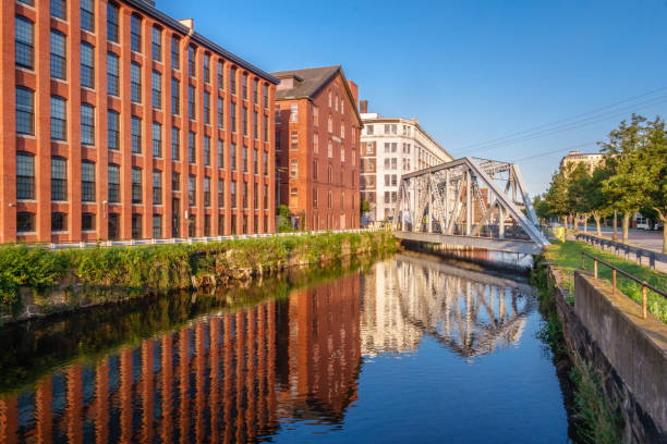 Mill buildings with canal stock photo