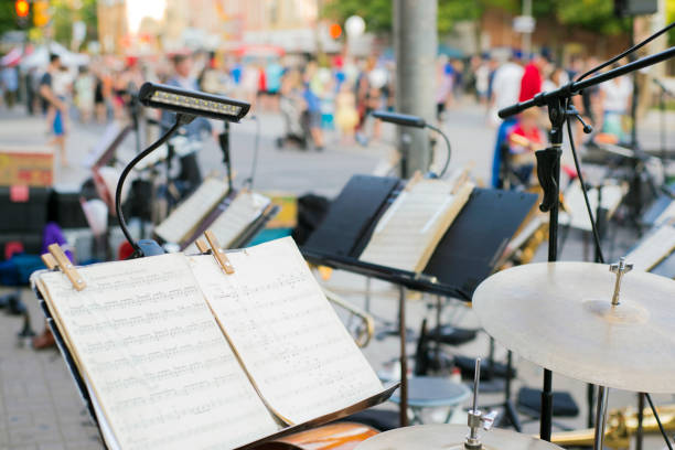 Band setting up the stage for a street music festival
