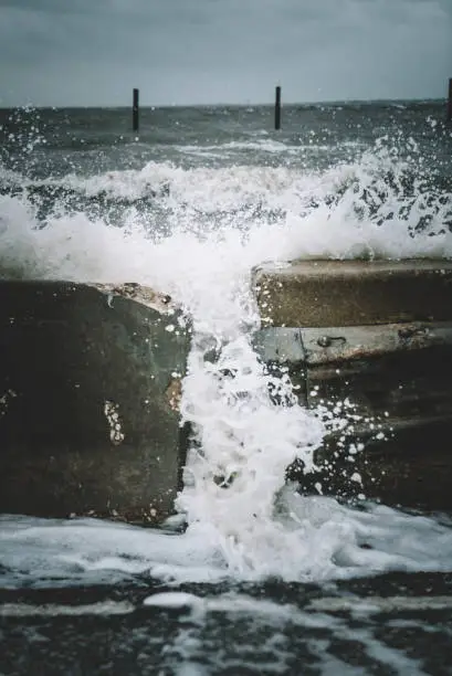 Photo of Water crashing over bridge during Hurricane