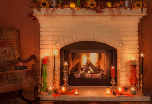 istock Brick fireplace with fall decorations and rocking chair(P) 852319966