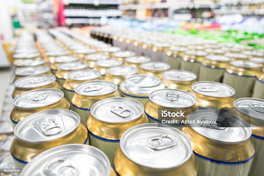 Aisles of shelves in supermarket Aisles of shelves with goods in supermarket Beer - Alcohol Stock Photo