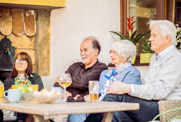 istock Social gathering Senior Friends outdoor having fun 852396310