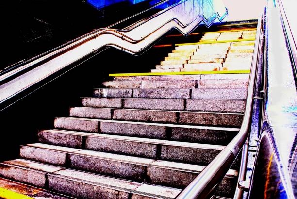 istock subway deep down stair with handrail by lowtone color 852396980