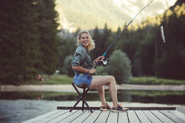 1,100+ Fishing Reel Woman Stock Photos, Pictures & Royalty-Free Images -  iStock