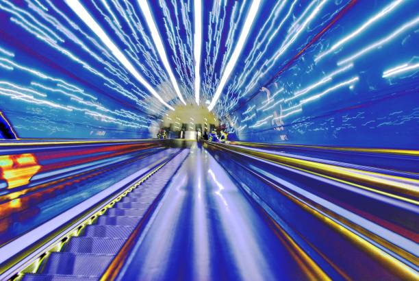 istock Blurred backround of moving futuristic escalator. Abstract 852397914