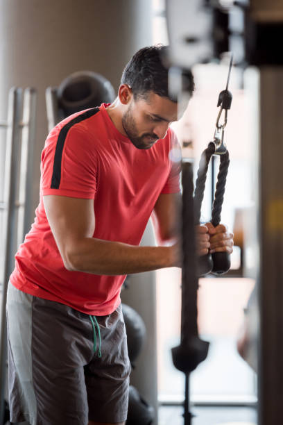 istock Man working out at the gym 852401244