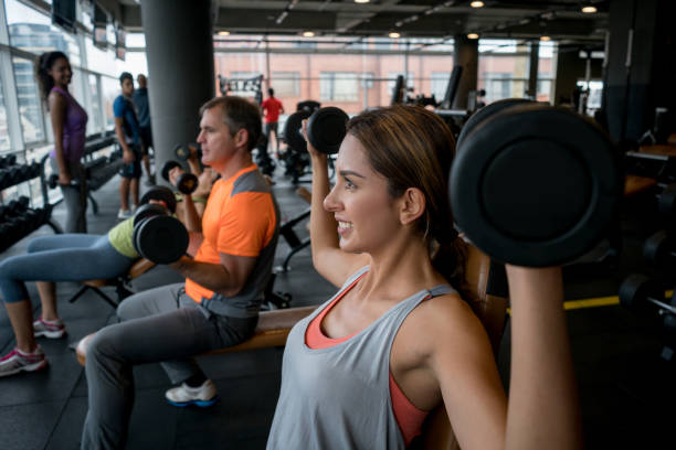 istock Group of people exercising at the gym 852401322