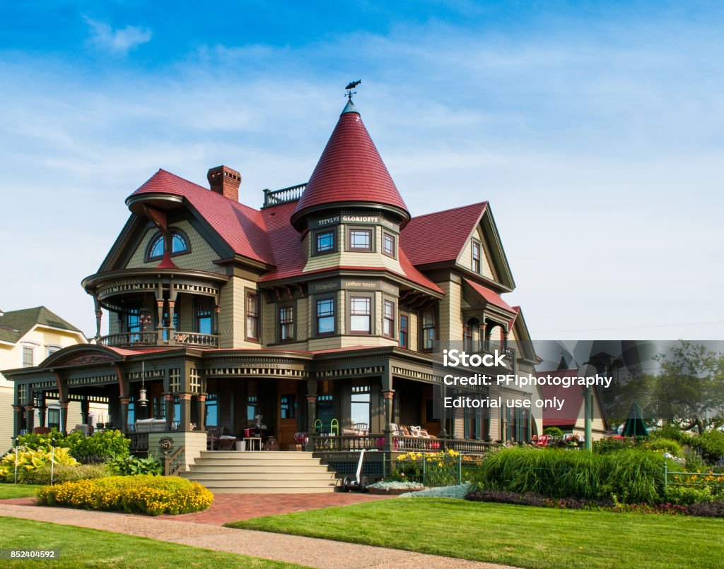 Corbin Norton House Oak Bluffs, Martha's Vineyard, Massachusetts – Jul 21, 2017: The Corbin Norton House (Peter Norton, Norton Utilities/Symantec), totally destroyed by fire in 2001, is pictured here fully restored to its original Queen Anne style residence which was completed in 2004. Victorian Style Stock Photo