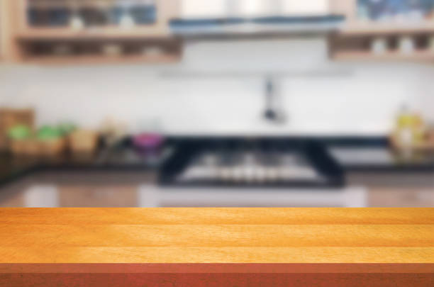 istock Empty wooden table and blurred kitchen background.can be used for montage or display your products. 852407780