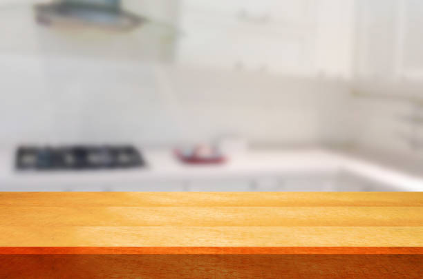 istock Empty wooden table and blurred kitchen background.can be used for montage or display your products. 852407788