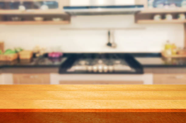 istock Empty wooden table and blurred kitchen background.can be used for montage or display your products. 852407790