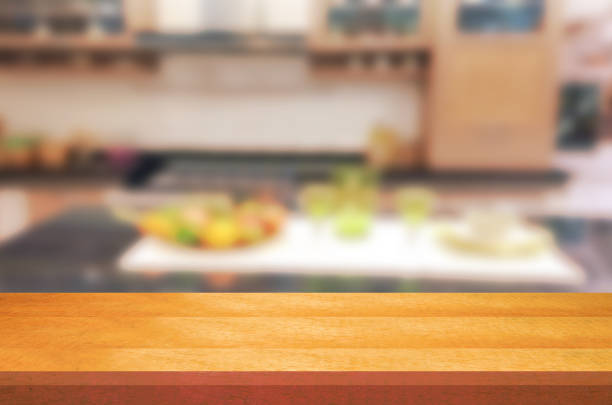 istock Empty wooden table and blurred kitchen background.can be used for montage or display your products. 852407802