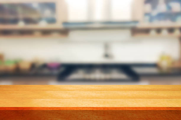 istock Empty wooden table and blurred kitchen background.can be used for montage or display your products. 852407810