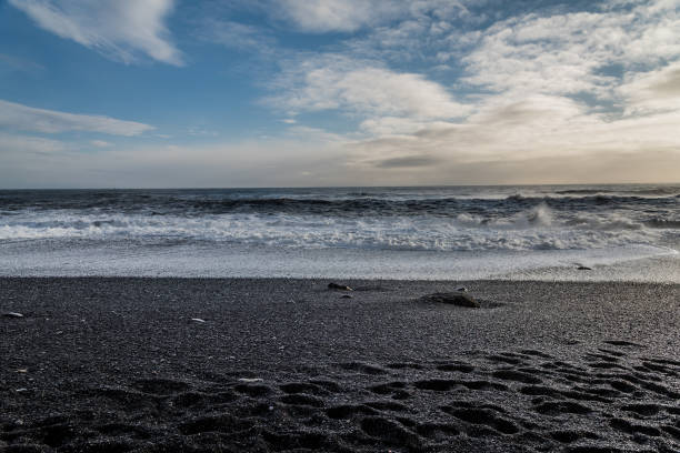 istock Reynisfjara or the black sand beach, Vik, Iceland 852411100