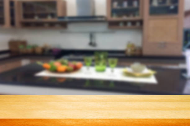 istock Empty wooden table and blurred kitchen background.can be used for montage or display your products. 852411898
